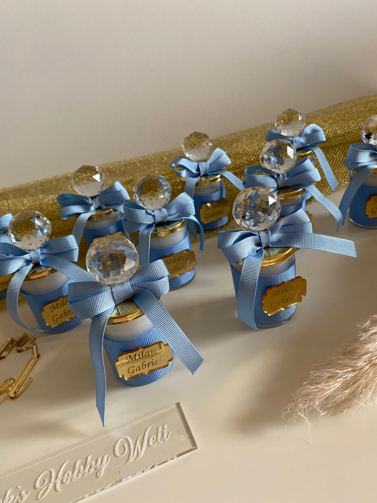 Gastgeschenke Kerzen Fläschchen mit Schleife